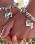 girls holding hands wearing Forever Best Friends Bracelets