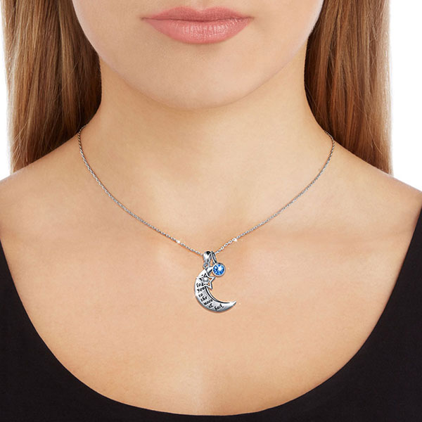 girl wearing i love you to the moon and back sterling silver necklace